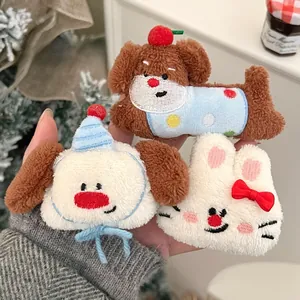 Detail view of plush cartoon animal embroidery clips including puppy and rabbit patterns