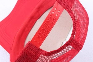 Detail of red Among Us mesh cap featuring adjustable plastic snapback strap and mesh fabric