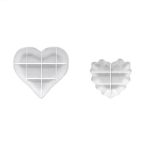 White heart-shaped silicone tray molds with 6 compartments and wavy lace edges