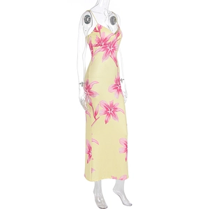 Detailed side view of yellow bodycon dress with pink lily print and slim straps