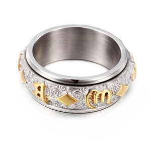 Rotating stainless steel spinner ring with golden mantra carvings for anxiety relief