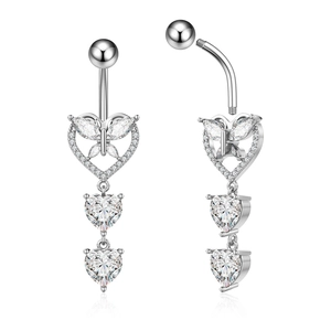 Macro detail of silver navel ring with zircon butterflies and heart-shaped crystal pendants