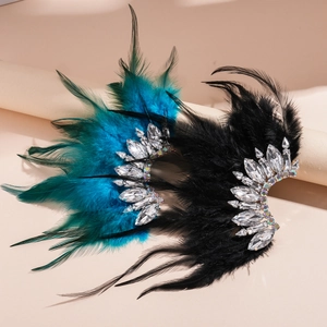 Bohemian crystal feather ear cuffs in teal and black with shimmering rhinestone accents