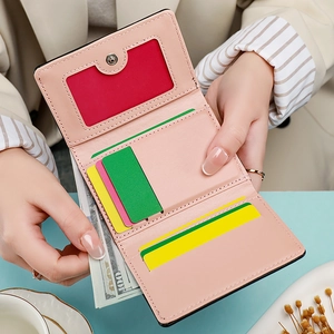 Pink minimalist trifold wallet in PU leather with multi-card slots and photo holder window