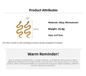 Detailed view of gold snake earrings with rhinestones measuring 8.5x3cm on white backdrop
