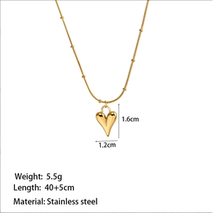 Gold heart pendant necklace in stainless steel with detailed product dimensions and specs