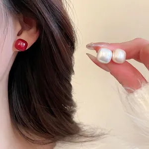Elegant square stud earring set in red, white, and cream beige with a vintage pearl finish