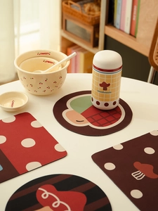 Close-up of mushroom and polka dot pattern heat-resistant diatom mud coasters