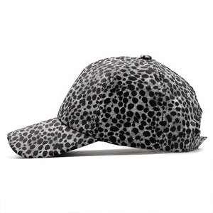 Side view of leopard print baseball cap featuring classic six-panel design and grey base