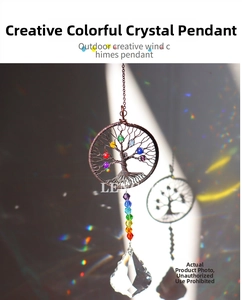 Macro detail of Tree of Life crystal suncatcher with colorful chakra beads and pendant