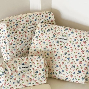 Three-piece quilted floral corduroy makeup bags set with floral patterns and zipper