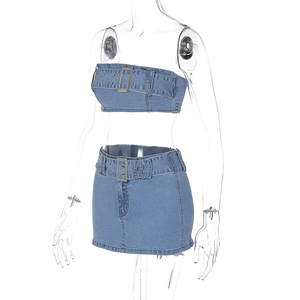Detail view of denim two-piece set featuring tube top and mini skirt with metal buckle belt