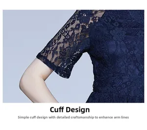 Détail d'une robe en dentelle bleu marine montrant les motifs floraux sur la manche