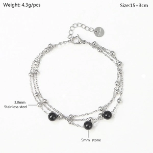 Three-layer stainless steel bracelet with black agate beads and 18k gold plating
