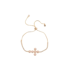 Adjustable gold butterfly cross bracelet with pink and white zircon stones on white background