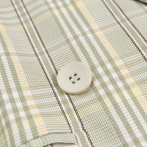 Relaxed fit light green plaid blazer jacket for women featuring a stylish button detail