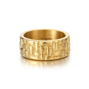 Vintage golden stainless steel wide ring featuring an irregular woven texture design