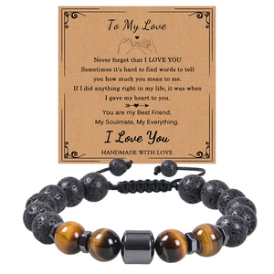 Detail of 10mm tiger eye and lava stone beaded bracelet with sentiment gift card