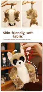 Detail of plush lemur toy with soft fabric texture and hanging loop for decoration