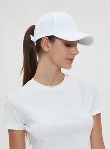 Detailed side view of breathable white cotton baseball cap showing classic 6-panel structure