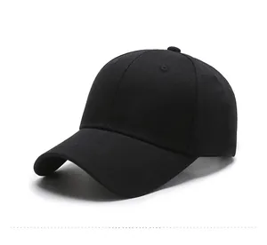 Detail view of the black cotton baseball cap showing white embroidered smiley face logo