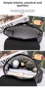 Detailed interior capacity showing quilted leather bag storage for cosmetics and phone