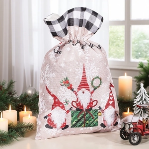 Sacchetto regalo di Natale in juta con gnomi e chiusura a coulisse a quadri bianchi