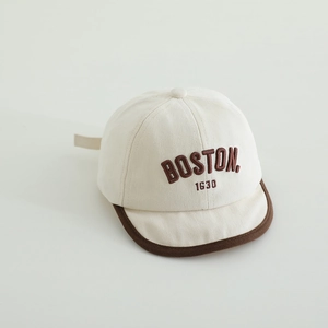 Detail view of cotton baby baseball cap featuring BOSTON 1630 embroidery and soft brim