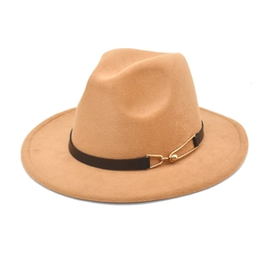 Close-up of camel wool fedora hat featuring a black leather band and gold metal buckle