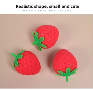 Three realistic squishy strawberries on a neutral background with leaf detail