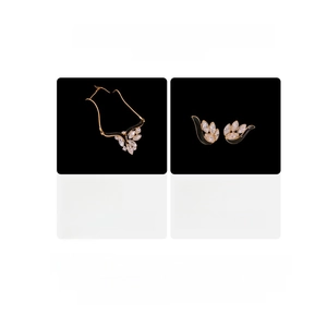 Detailed specs of vintage crystal wing jewelry set including necklace and earrings