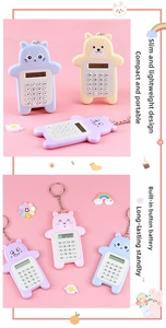 Detail view of 0.8cm ultra-thin mini bear pocket calculator with keychain attachment