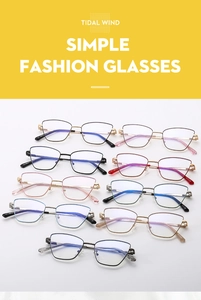 Detail view of multi-color metal eyeglass frames with anti-blue light lenses and thin temples