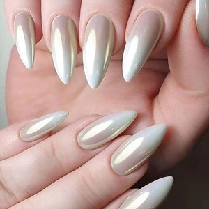 Close-up of long almond-shaped press-on nails with white chrome pearl finish