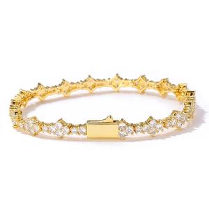 Golden hip hop star link bracelet with brilliant zircon stones on white background