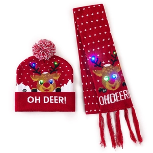 Detail of red Christmas knit hat and scarf set with LED glowing reindeer and Oh Deer text