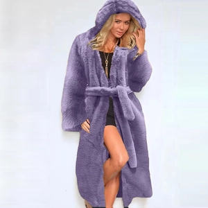 Full-length detail of long purple faux fur hooded coat with thick plush texture
