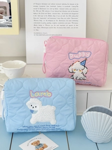 Cute quilted makeup bags in pink and sky blue featuring adorable animal embroidery