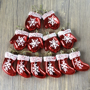 Set of 12 red Christmas tree ornaments featuring glitter snowflake gloves and socks