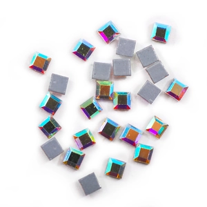 Macro view of square AB iridescent K9 glass rhinestones with grey flat back for DIY art