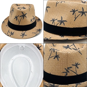 Detailed views of summer paper straw fedora with coconut tree print and size tag details