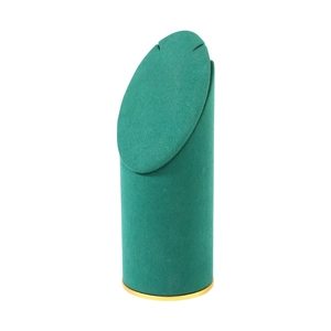 Green velvet cylinder jewelry stand with gold trim for luxury necklace display