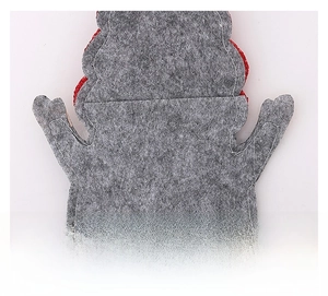 Detail of grey felt Christmas cutlery holder back with precise white decorative stitching