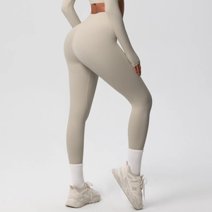 Detailed back view of high-waisted seamless yoga leggings and top with lifting effect