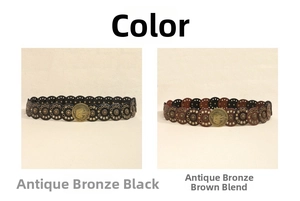 Detail of bohemian punk belts with engraved metal discs and studded eyelets