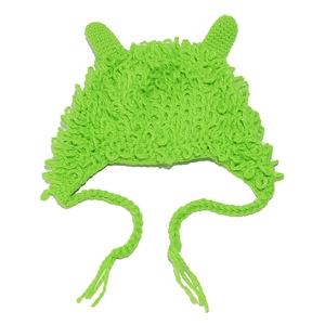Detailed view of handmade green knit monster hat with fringe and long braided chin straps