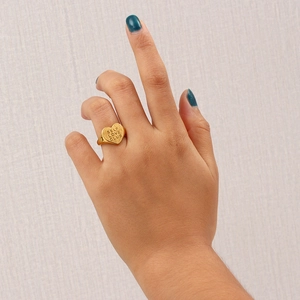 Polished 18K gold stainless steel heart signet ring engraved with SELF LOVE CLUB