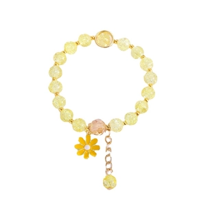 Handmade flower bracelet with yellow burst crystals and daisy charm for women