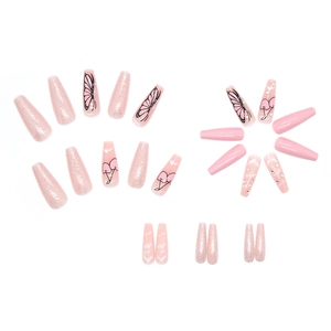 Pink glitter coffin press-on nails with butterfly and cherry designs and rhinestones