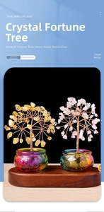 Detail of natural citrine and rose quartz crystal trees with colorful glass basins